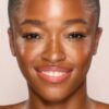 UNREAL SKIN SHEER GLOW TINT FEUCHTIGKEITSSPENDENDER FOUNDATION-STICK 12.5 TAN