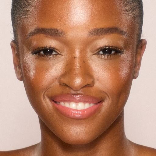 UNREAL SKIN SHEER GLOW TINT FEUCHTIGKEITSSPENDENDER FOUNDATION-STICK 12.5 TAN