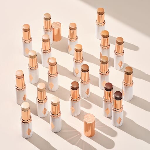 UNREAL SKIN SHEER GLOW TINT FEUCHTIGKEITSSPENDENDER FOUNDATION-STICK 13 DEEP